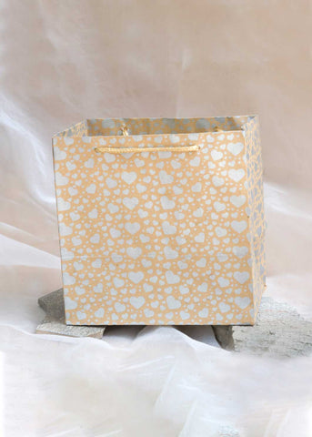 Craft paper bag 7x14 size Heart patter is printed on it_ Yellow laces bag silver print